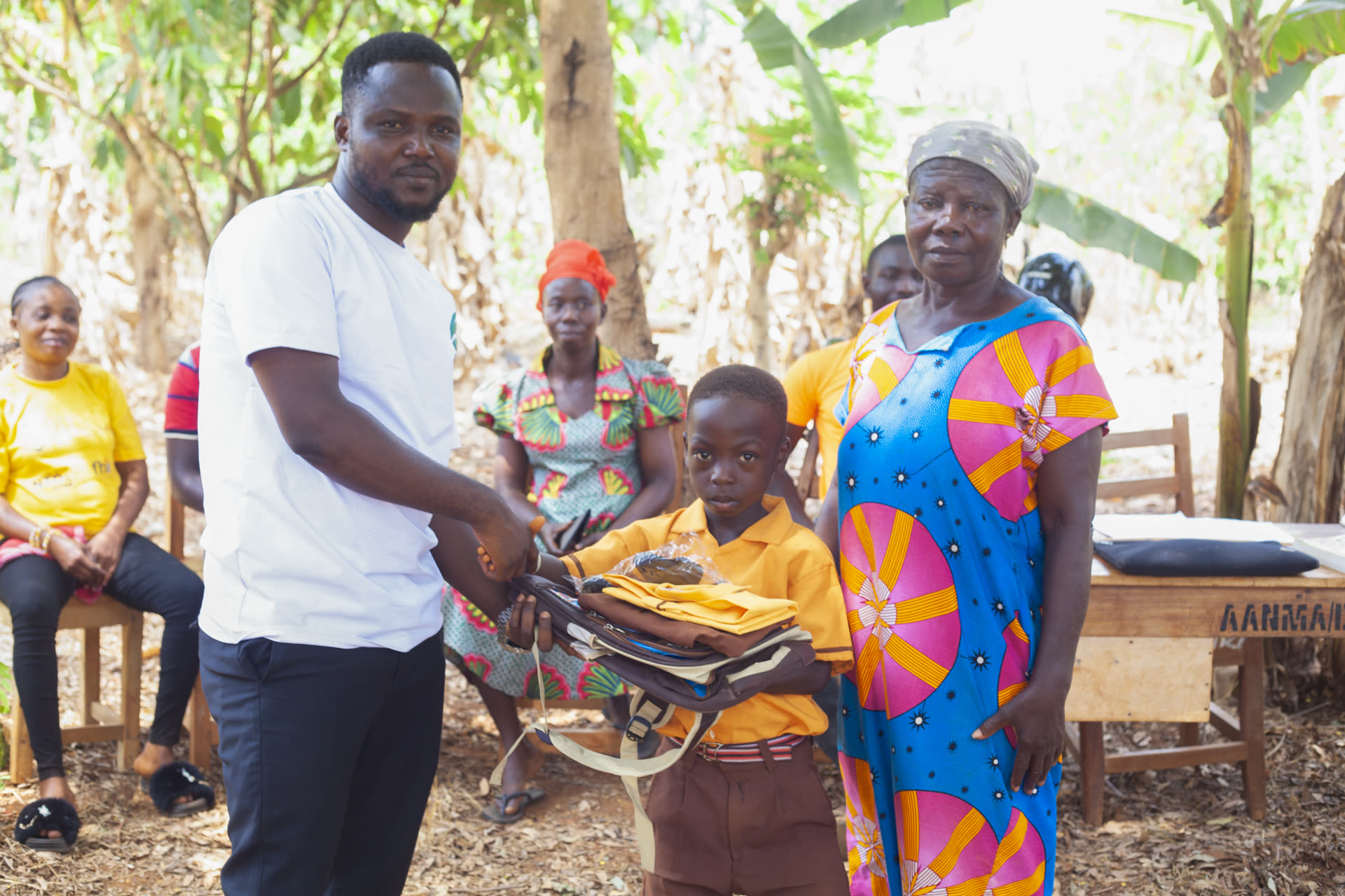 Volunteers with children in rural Ghana